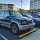 Illustration for article titled Todays hippie market survivor is this Suzuki Sidekick Sport